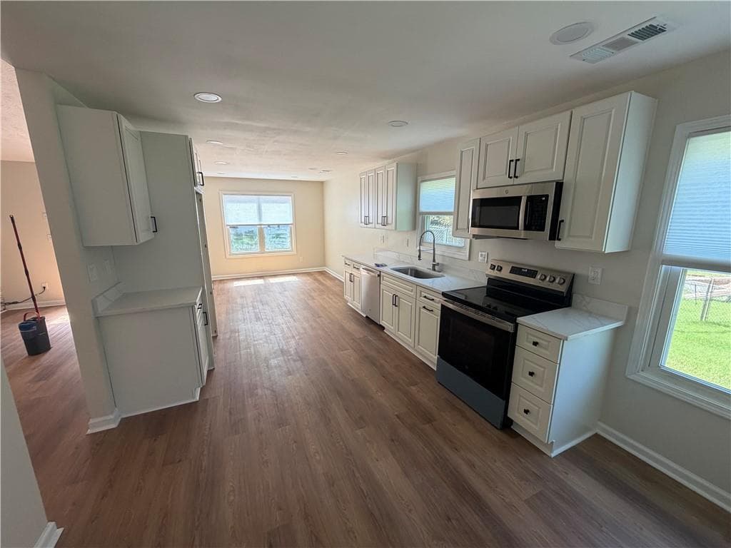4 bedroom, 2 bathroom, 1,650 sq ft single family residence for rent at 2694 Palm Creek Court, Dacula, GA 30019 for $2,550 a month — photo 3