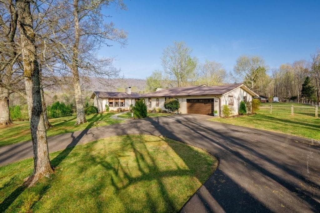 5 bedroom, 4 bathroom, 4,640 sq ft single family residence for sale at 1254 Mountain Loop Road, Sugar Valley, GA 30746