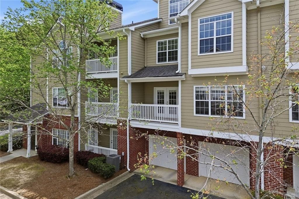 2 bedroom, 3 bathroom, 1,379 sq ft condominium for sale at 2111 Woodland Lane, Alpharetta, GA 30009 — photo 2