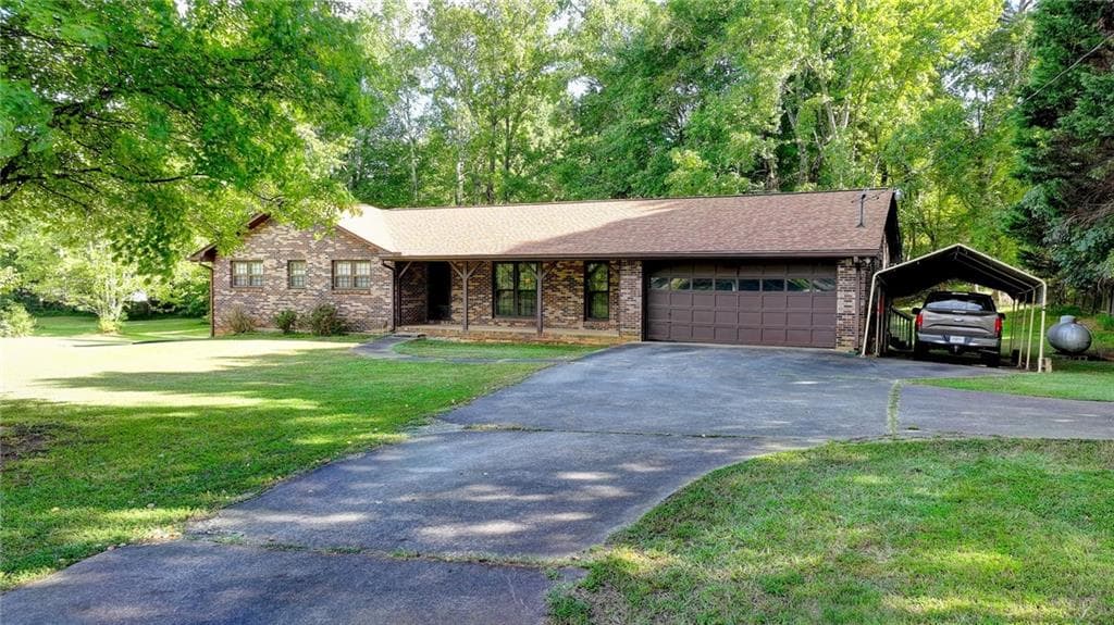 3 bedroom, 3 bathroom, 1,582 sq ft single family residence for sale at 5680 Abbotts Bridge Road, Johns Creek, GA 30097