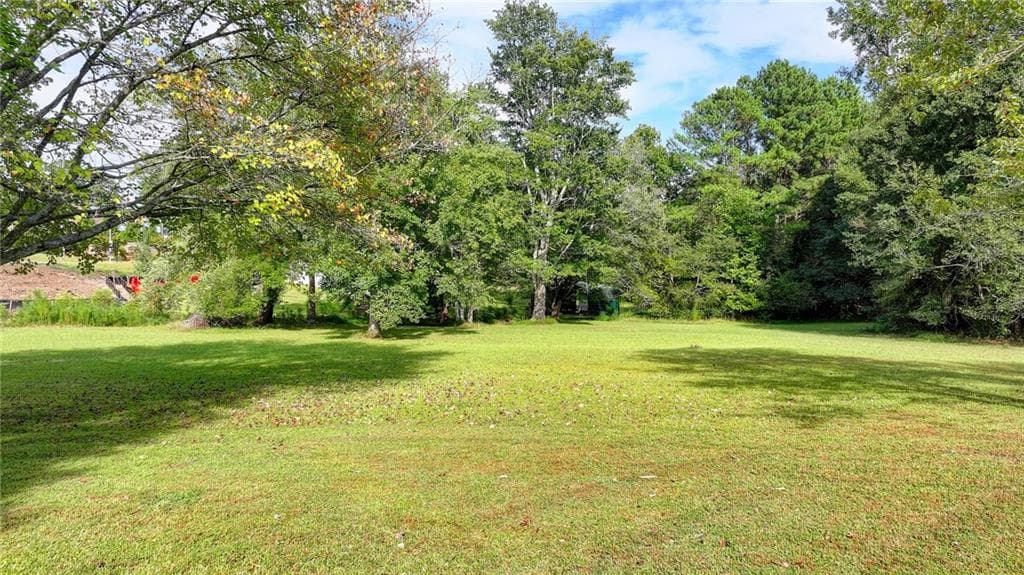 3 bedroom, 3 bathroom, 1,582 sq ft single family residence for sale at 5680 Abbotts Bridge Road, Johns Creek, GA 30097 — photo 5