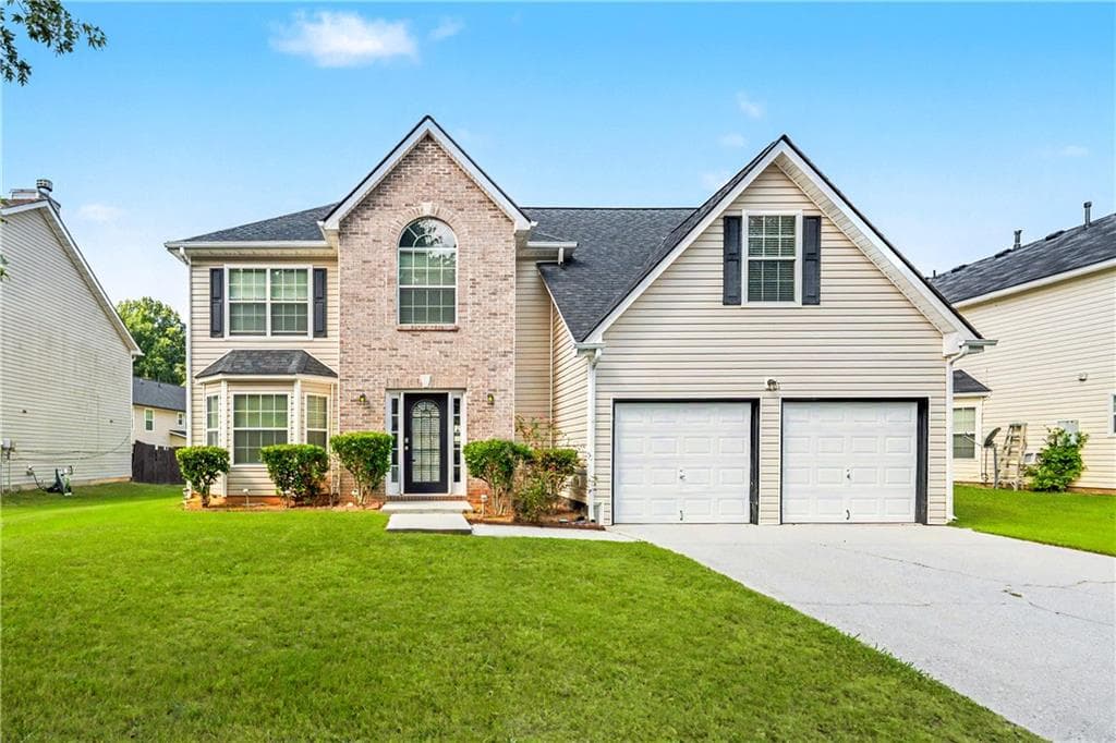 4 bedroom, 3 bathroom, 2,784 sq ft single family residence for sale at 4455 Ivy Fork Drive, Loganville, GA 30052 — photo 1 of 24