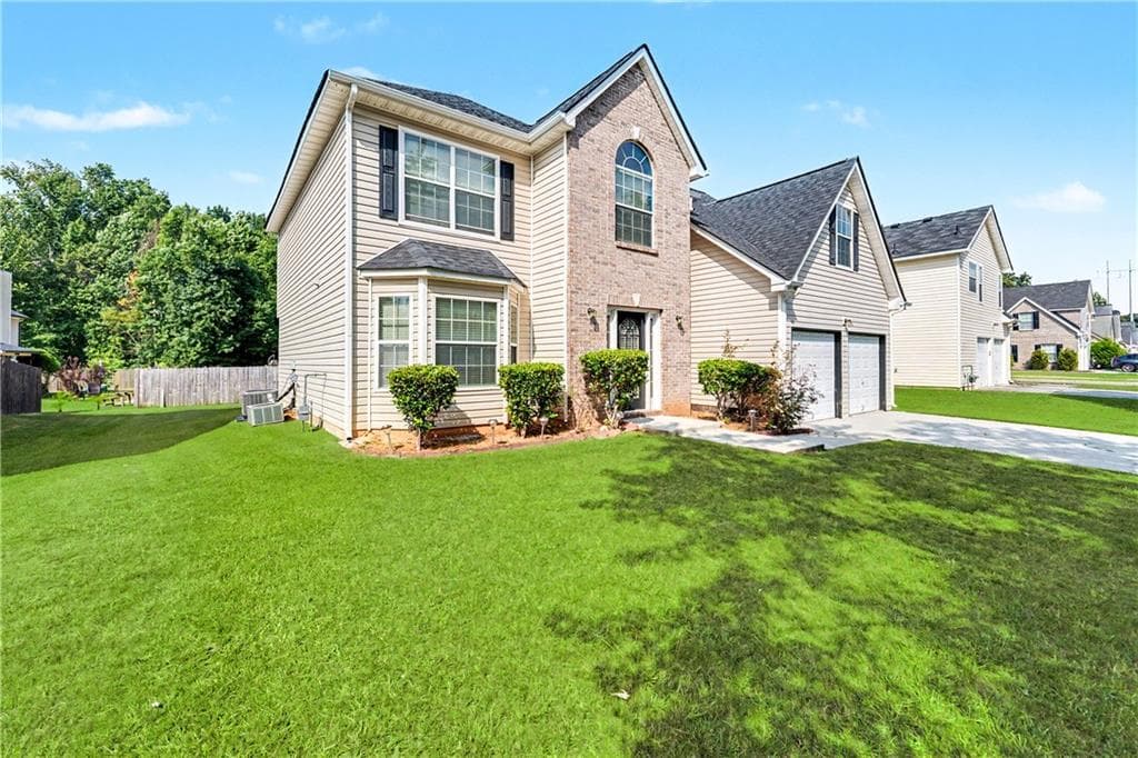 4 bedroom, 3 bathroom, 2,784 sq ft single family residence for sale at 4455 Ivy Fork Drive, Loganville, GA 30052 — photo 2