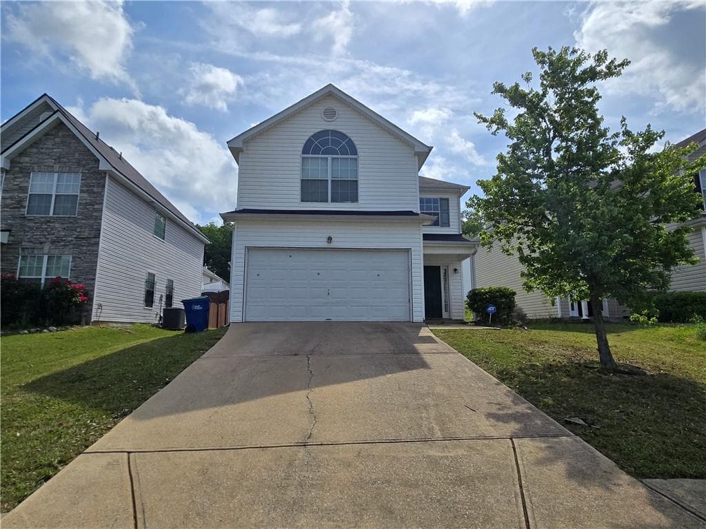 3 bedroom, 3 bathroom, 1,936 sq ft single family residence for rent at 5636 One Lake Way, Atlanta, GA 30349 for $2,050 a month — photo 2