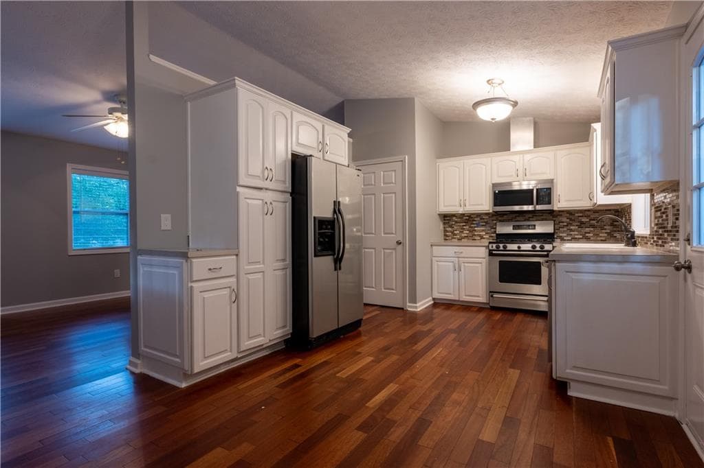 4 bedroom, 3 bathroom, 2,400 sq ft single family residence for sale at 2424 Rhine Court, Lawrenceville, GA 30043 — photo 5
