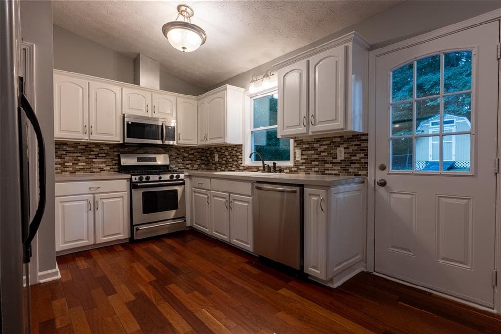 4 bedroom, 3 bathroom, 2,400 sq ft single family residence for sale at 2424 Rhine Court, Lawrenceville, GA 30043 — photo 6