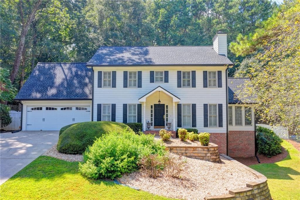 4 bedroom, 3 bathroom, 3,200 sq ft single family residence for sale at 4634 Camber Well Lane, Suwanee, GA 30024 — photo 1 of 40