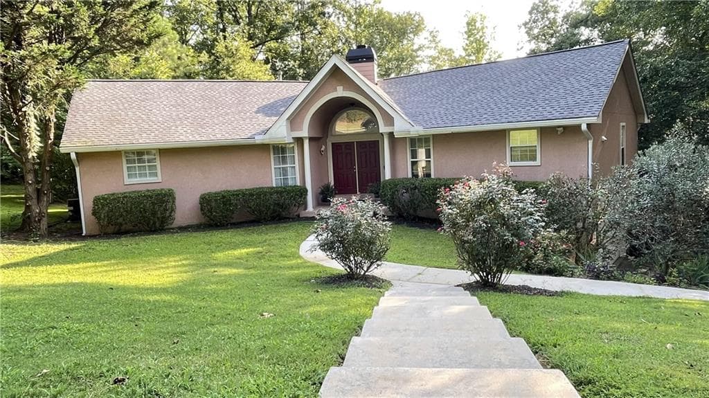 4 bedroom, 2 bathroom, 2,226 sq ft single family residence for sale at 4221 Riverlake Way, Snellville, GA 30039 — photo 2