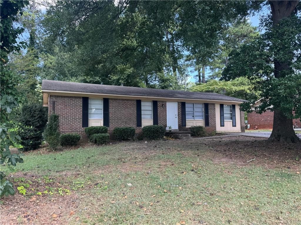 4 bedroom, 2 bathroom, 1,326 sq ft single family residence for sale at 723 Sheffield Road, Norcross, GA 30071 — photo 2