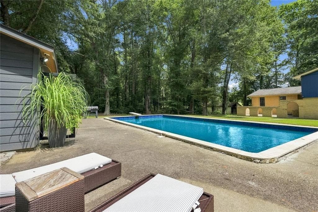 4 bedroom, 3 bathroom, 3,420 sq ft single family residence for sale at 3806 Loganville Highway, Loganville, GA 30052 — photo 2