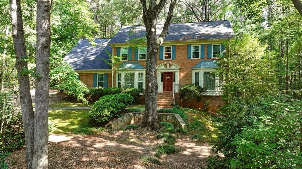 4 bedroom, 3 bathroom, 3,264 sq ft single family residence for sale at 6051 Millstone Run, Stone Mountain, GA 30087 — photo 2