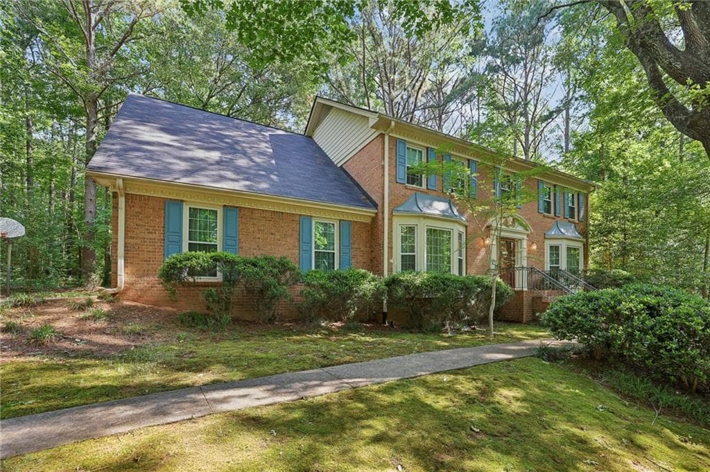 4 bedroom, 3 bathroom, 3,264 sq ft single family residence for sale at 6051 Millstone Run, Stone Mountain, GA 30087 — photo 4