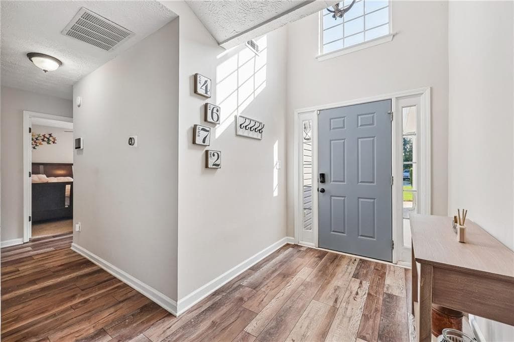 3 bedroom, 2 bathroom, 1,852 sq ft single family residence for sale at 4672 Devencrest Lane, Buford, GA 30519 — photo 2