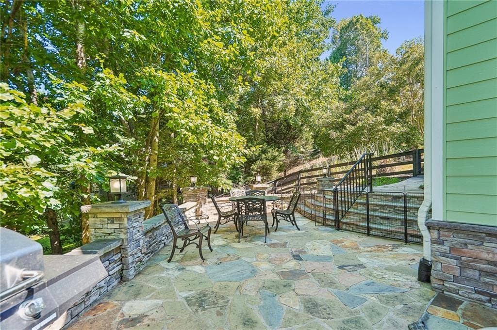 5 bedroom, 4 bathroom, 4,100 sq ft single family residence for sale at 5448 Speckled Wood Lane, Gainesville, GA 30506 — photo 6