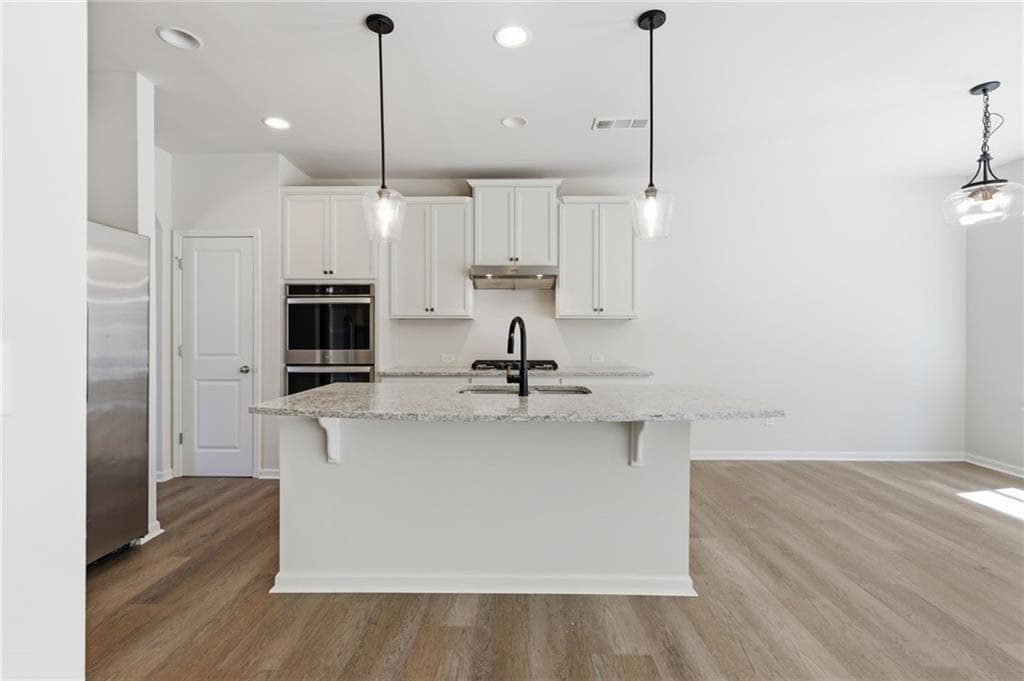 5 bedroom, 3 bathroom, 2,822 sq ft single family residence for sale at 6135 Banyan Trail, Cumming, GA 30028 — photo 8