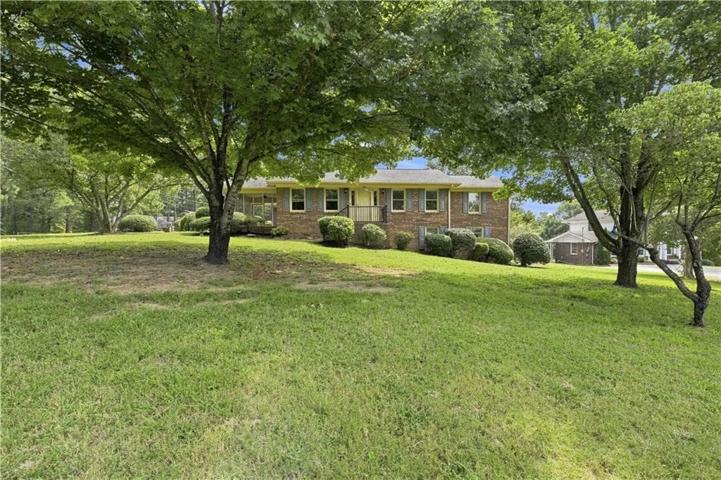 4 bedroom, 3 bathroom, 2,804 sq ft single family residence for sale at 208 Woodland Circle, Calhoun, GA 30701