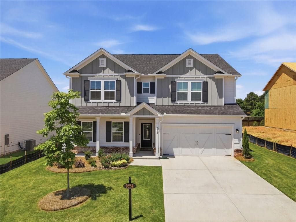 4 bedroom, 3 bathroom, 3,058 sq ft single family residence for sale at 1654 Tide Mill Road, Cumming, GA 30040 — photo 1 of 50