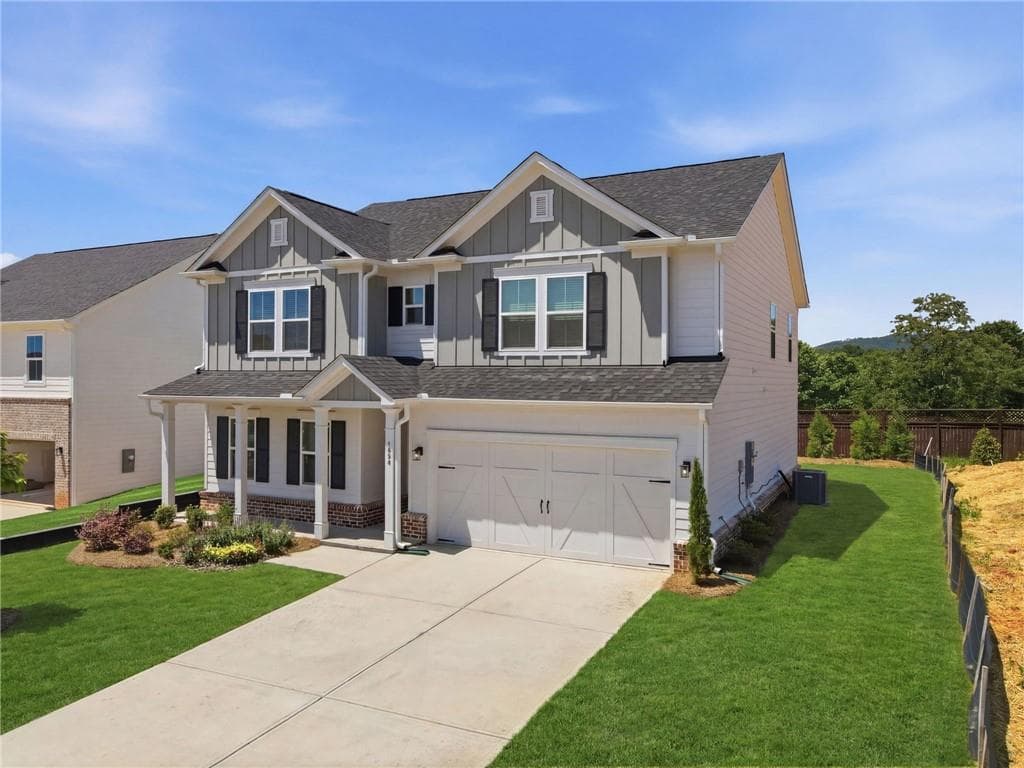 4 bedroom, 3 bathroom, 3,058 sq ft single family residence for sale at 1654 Tide Mill Road, Cumming, GA 30040 — photo 2
