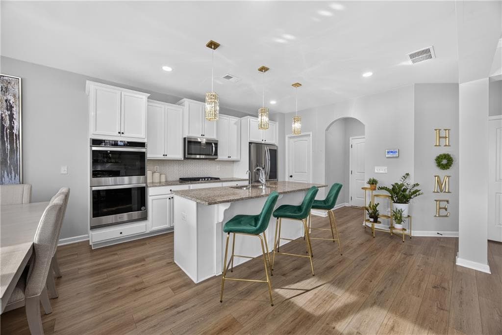 4 bedroom, 3 bathroom, 2,616 sq ft single family residence for sale at 4903 Elm Leaf Drive, Atlanta, GA 30331 — photo 6
