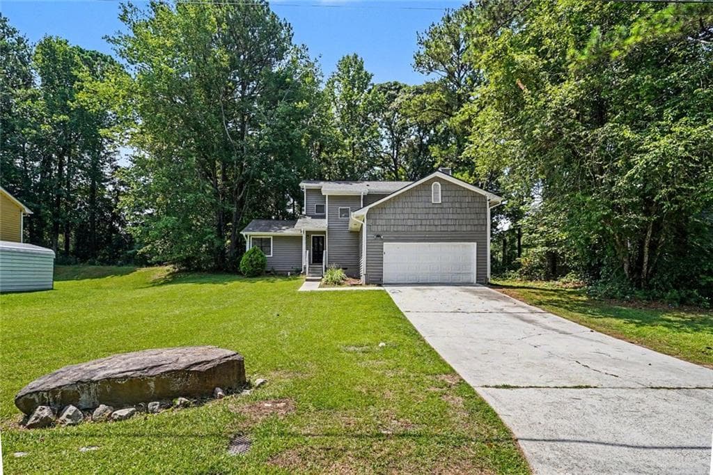 3 bedroom, 3 bathroom, 1,886 sq ft single family residence for sale at 5017 Grace Hill Road, Lithonia, GA 30038 — photo 2