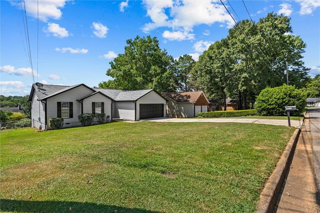 3 bedroom, 2 bathroom, 1,474 sq ft single family residence for sale at 3679 Ashbill, Rex, GA 30273 — photo 2