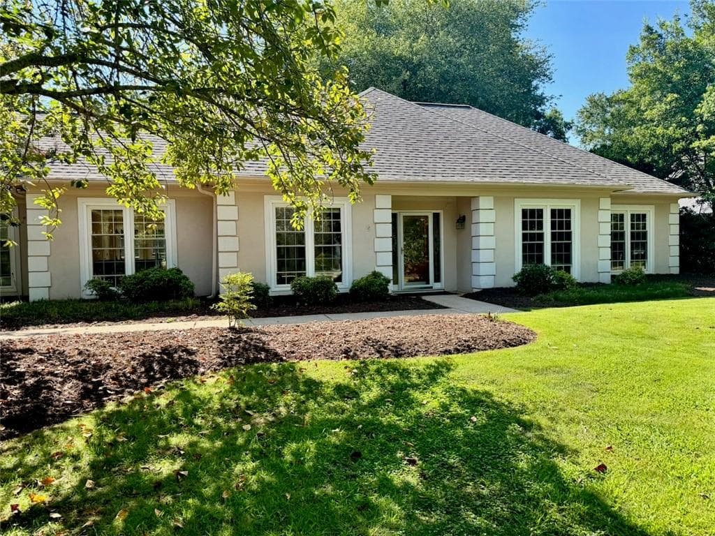 4 bedroom, 2 bathroom, 2,602 sq ft single family residence for sale at 11860 Wexford Club Drive, Roswell, GA 30075 — photo 1 of 17