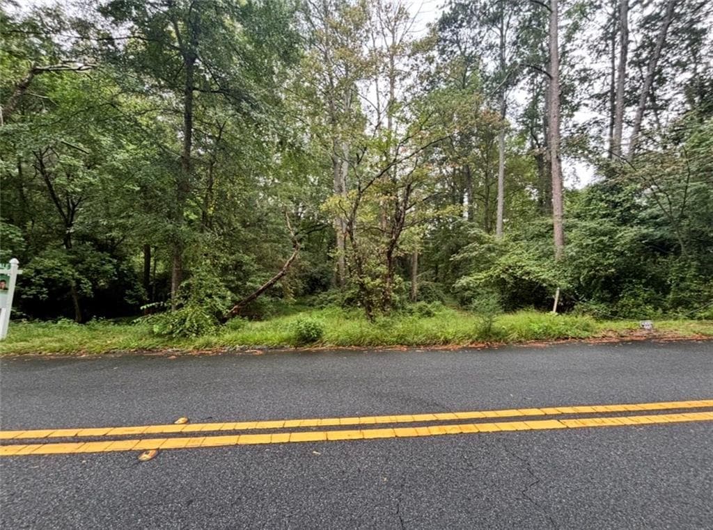 unimproved land under contract at 8 N Poplar Street, Fairburn, GA 30213 — photo 7