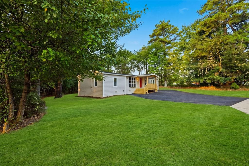 3 bedroom, 2 bathroom, 1,580 sq ft single family residence for sale at 1077 New Hope Road, Lawrenceville, GA 30045 — photo 2