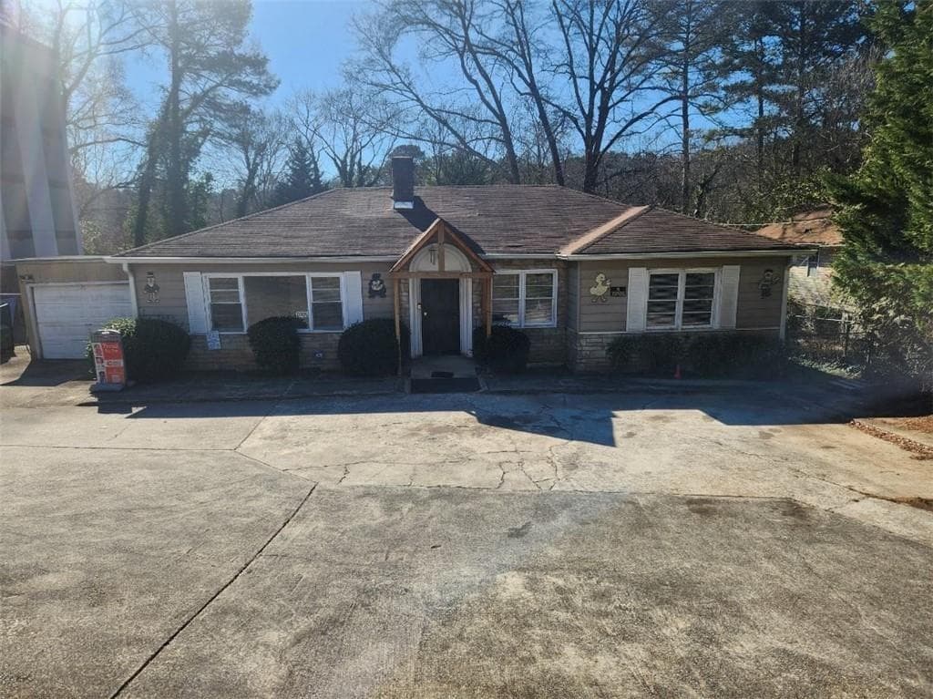 5 bedroom, 4 bathroom, 3,169 sq ft single family residence for sale at 1909 Flat Shoals Road, Atlanta, GA 30316
