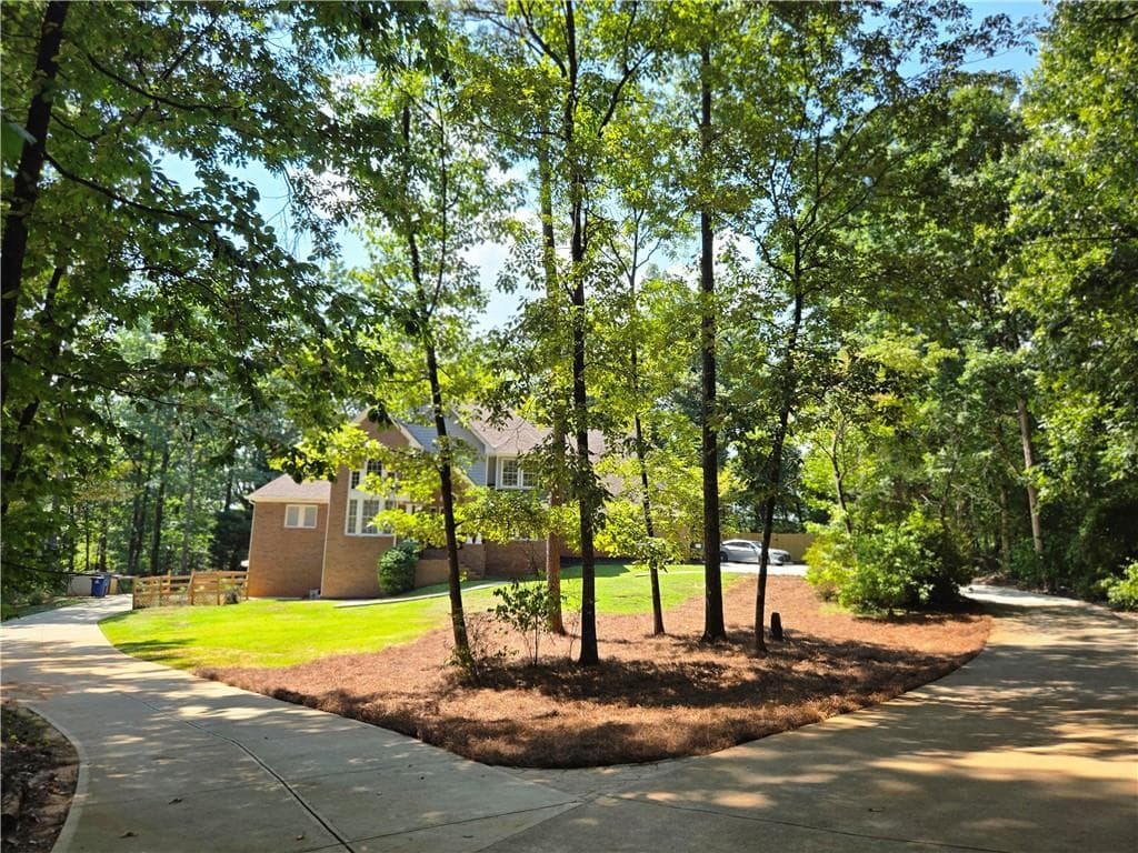 4 bedroom, 5 bathroom, 6,295 sq ft single family residence for sale at 2453 SE Lost Valley Trail, Conyers, GA 30094 — photo 3