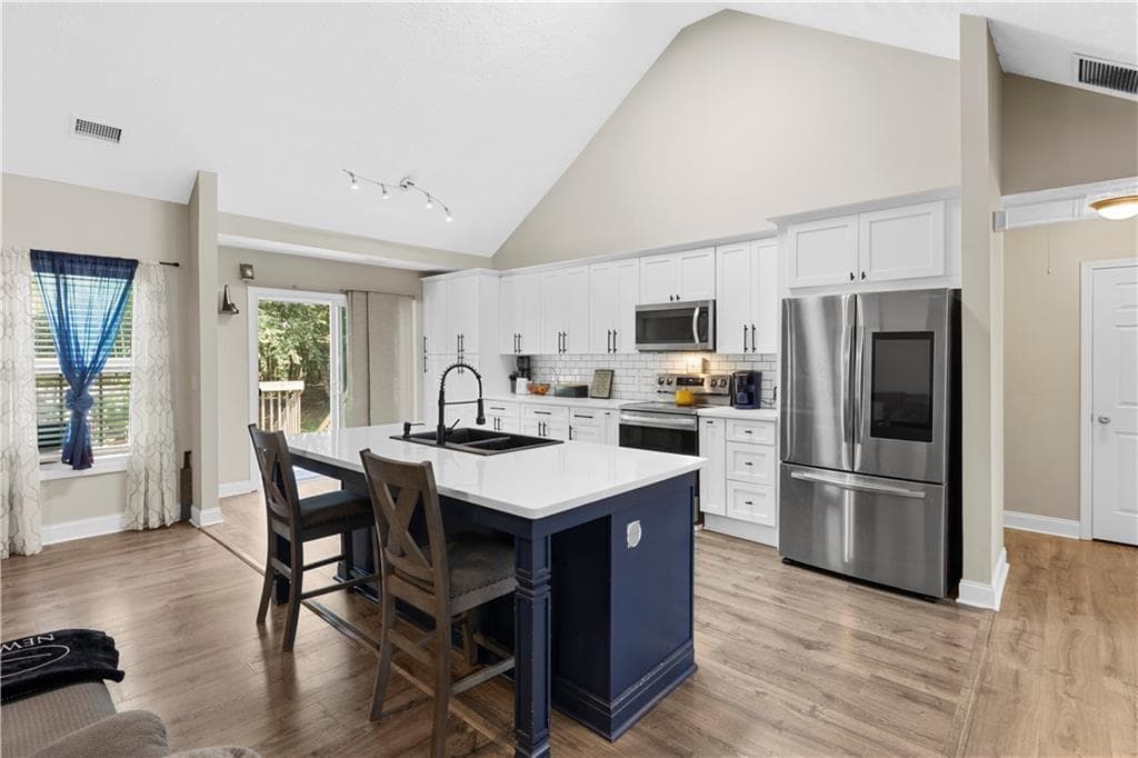 4 bedroom, 3 bathroom, 2,476 sq ft single family residence for sale at 3161 Keenly Ives Court, Buford, GA 30519 — photo 6