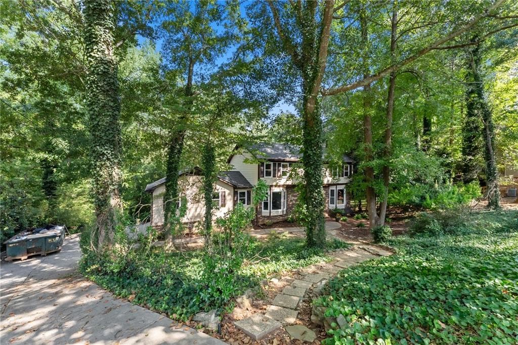 5 bedroom, 4 bathroom, 2,896 sq ft single family residence for sale at 3824 Shawnee Run, Lilburn, GA 30047 — photo 1 of 53