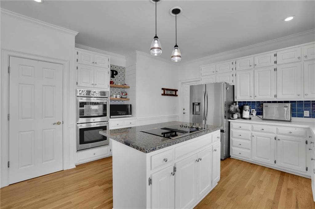 5 bedroom, 3 bathroom, 3,428 sq ft single family residence for sale at 4745 Aldbury Lane, Suwanee, GA 30024 — photo 5