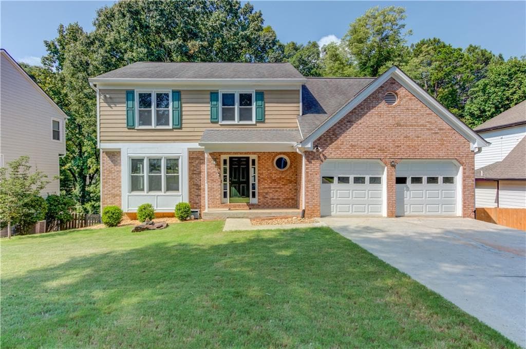 4 bedroom, 3 bathroom, 3,328 sq ft single family residence for sale at 909 Colony Creek Drive, Lawrenceville, GA 30043