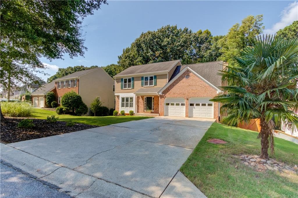 4 bedroom, 3 bathroom, 3,328 sq ft single family residence for sale at 909 Colony Creek Drive, Lawrenceville, GA 30043 — photo 2