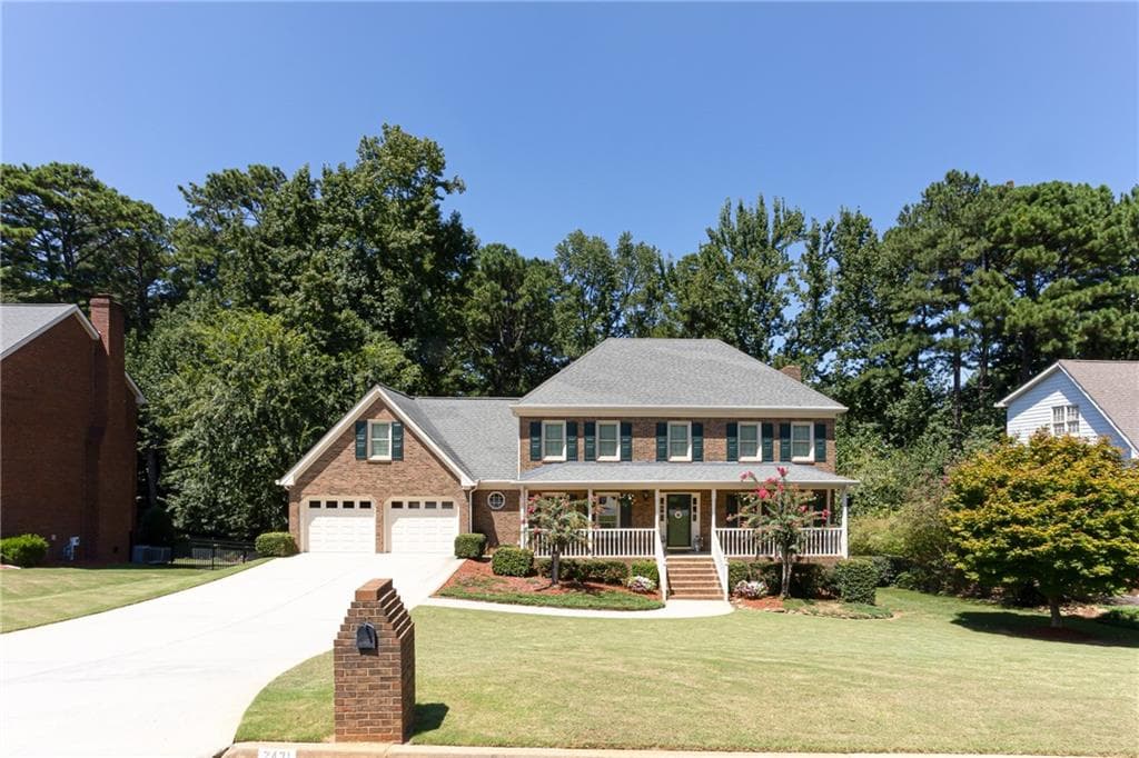 5 bedroom, 3 bathroom, 4,131 sq ft single family residence for sale at 2431 Chimney Top Lane, Snellville, GA 30078 — photo 2