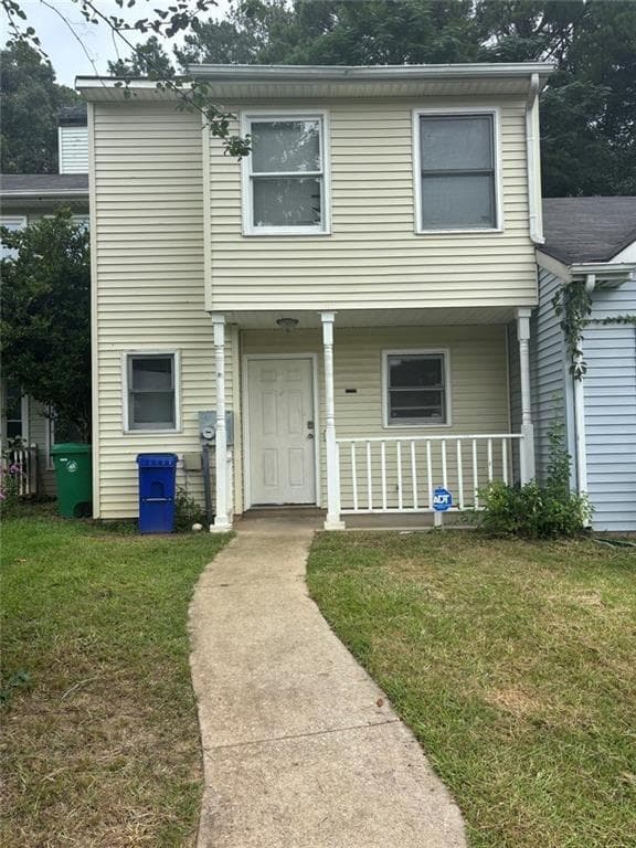 2 bedroom, 3 bathroom, 1,296 sq ft townhouse for sale at 2316 Wellington Circle, Lithonia, GA 30058 — photo 1 of 20
