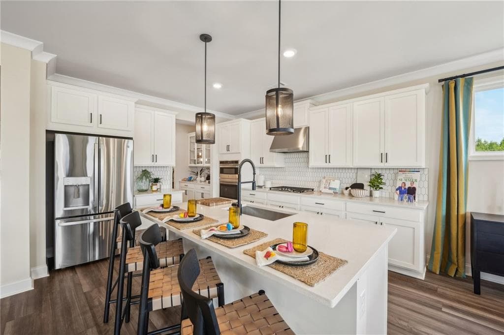 5 bedroom, 4 bathroom, 3,236 sq ft single family residence for sale at 445 Kennington Walk, Loganville, GA 30052 — photo 2