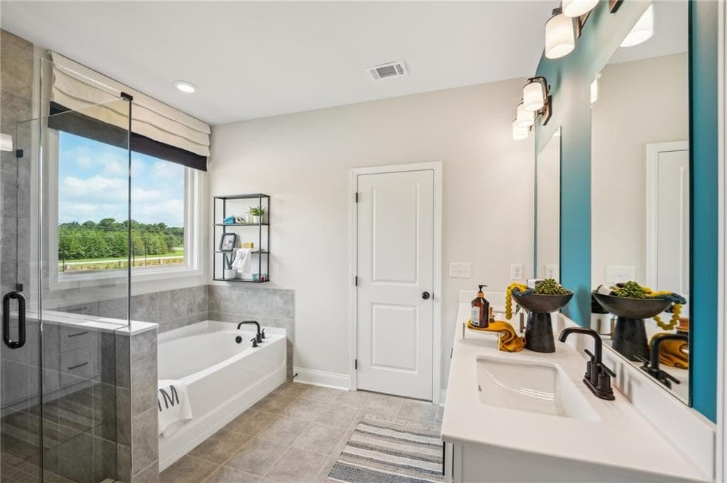 5 bedroom, 4 bathroom, 3,236 sq ft single family residence for sale at 445 Kennington Walk, Loganville, GA 30052 — photo 4