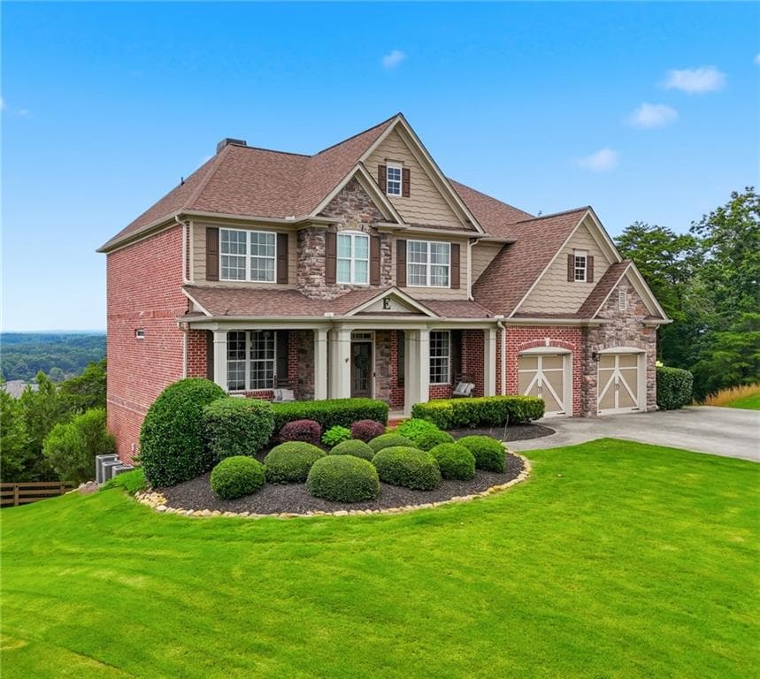 6 bedroom, 5 bathroom, 4,330 sq ft single family residence for sale at 5085 Laurel Ridge Drive, Cumming, GA 30040 — photo 2