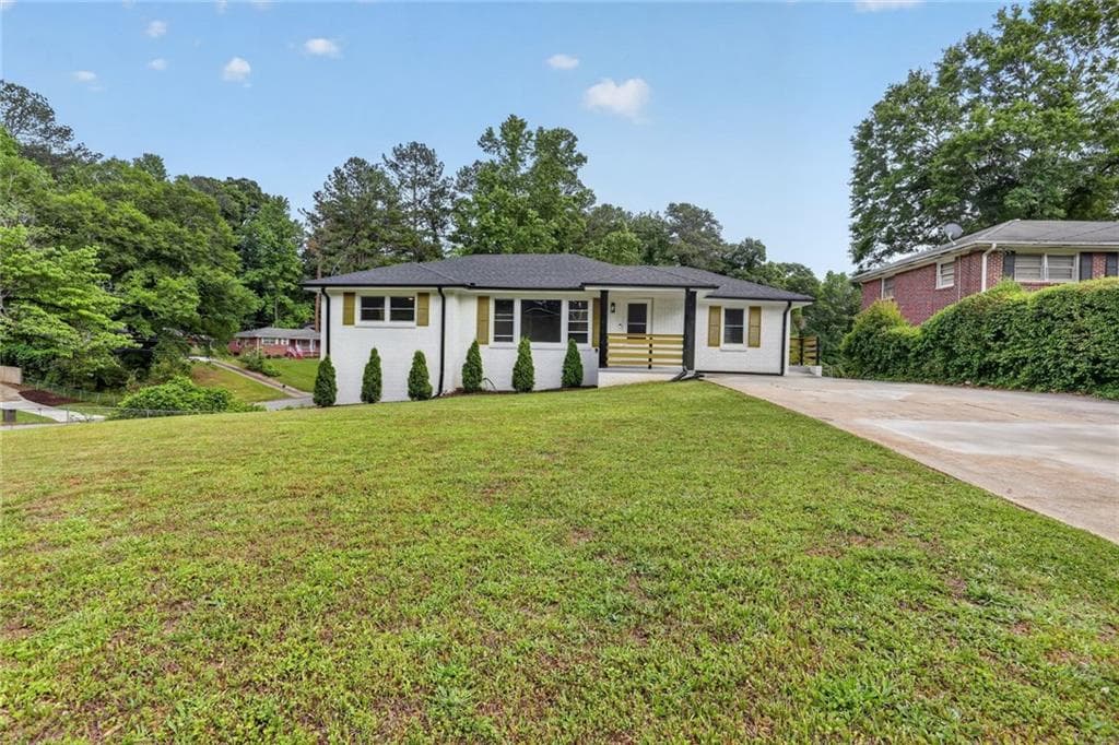 4 bedroom, 3 bathroom, 1,373 sq ft single family residence for sale at 3081 Glendale Court, Decatur, GA 30032 — photo 1 of 15