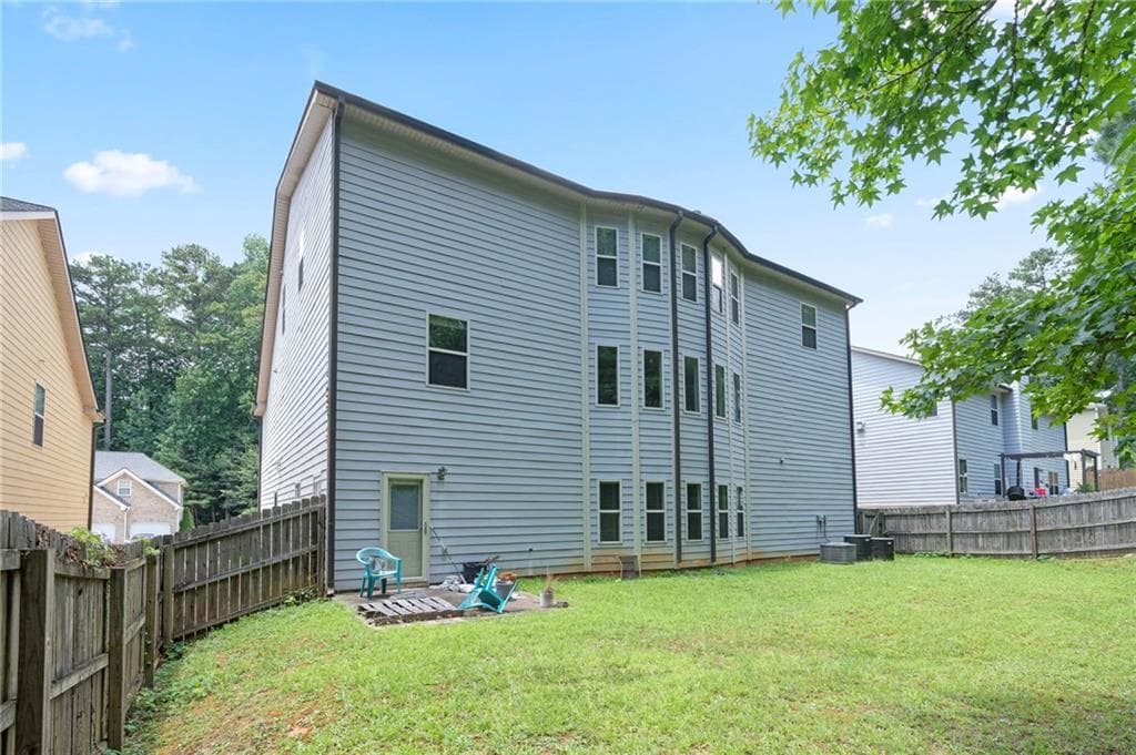 7 bedroom, 6 bathroom, 5,608 sq ft single family residence for sale at 4276 Shamrock Drive, Atlanta, GA 30349 — photo 2
