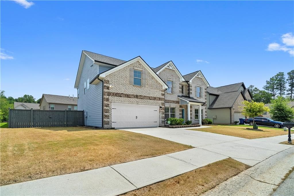 6 bedroom, 3 bathroom, 4,480 sq ft single family residence for sale at 5673 Wyncreek Circle, Atlanta, GA 30331 — photo 3