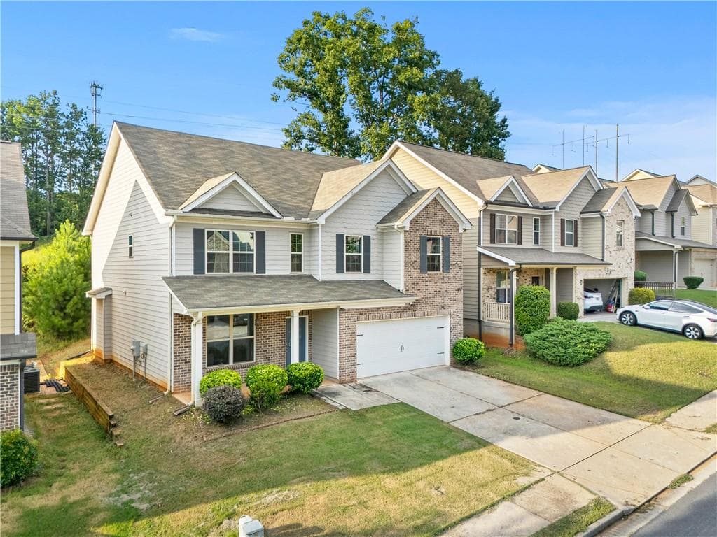 4 bedroom, 3 bathroom, 2,690 sq ft single family residence for sale at 1430 Ox Bridge Way, Lawrenceville, GA 30043 — photo 2
