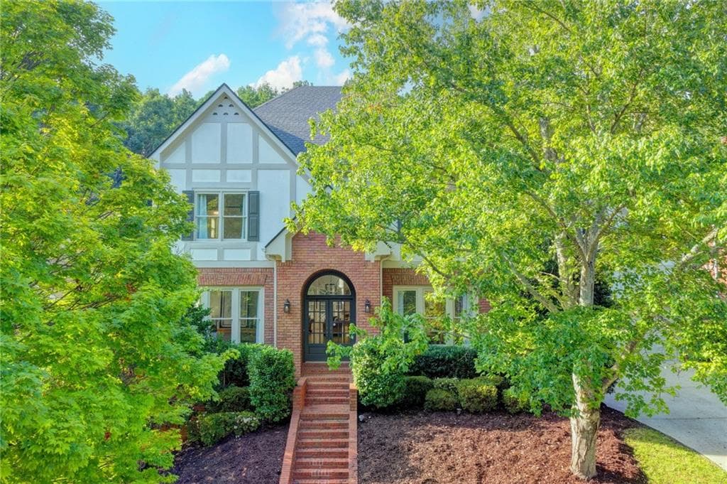 4 bedroom, 4 bathroom, 4,202 sq ft single family residence for sale at 1071 Moores Walk Lane, Suwanee, GA 30024 — photo 2