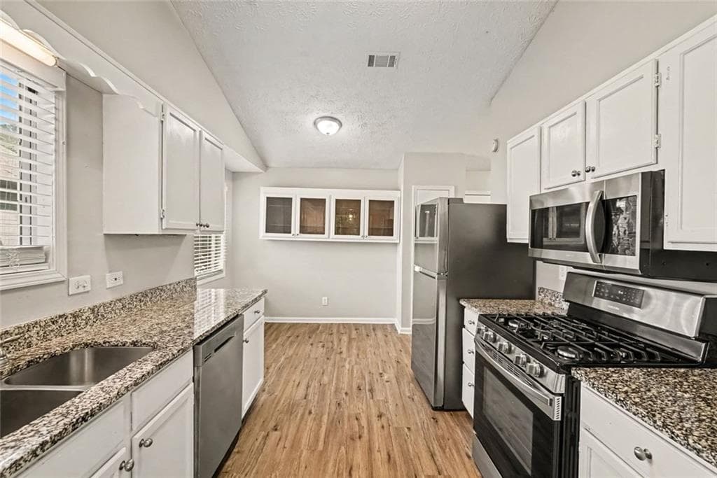 3 bedroom, 2 bathroom, 1,396 sq ft single family residence for sale at 911 Riverstone Way, Woodstock, GA 30188 — photo 8