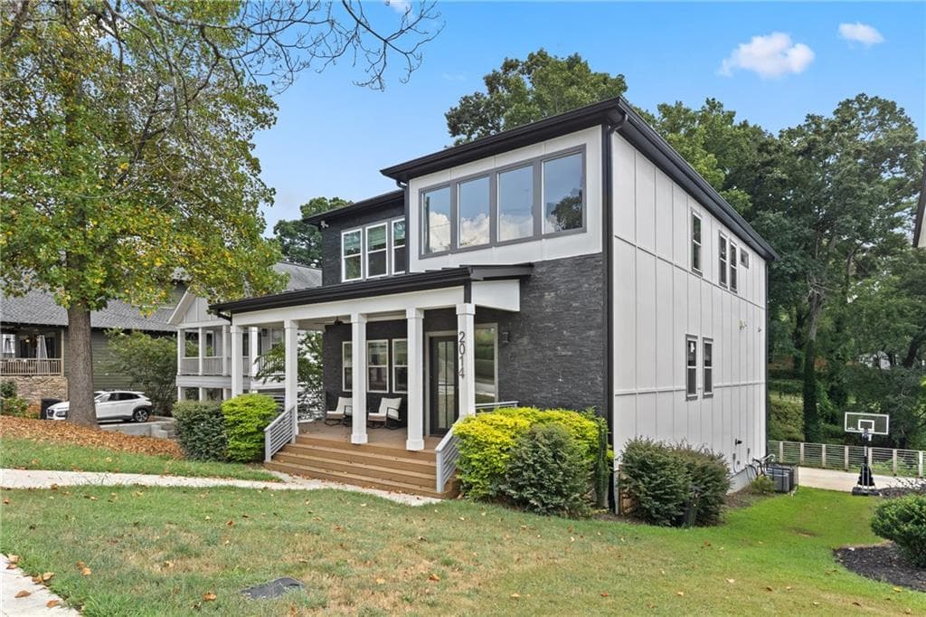 5 bedroom, 4 bathroom, 3,900 sq ft single family residence for sale at 2014 Cambridge Avenue, College Park, GA 30337 — photo 2