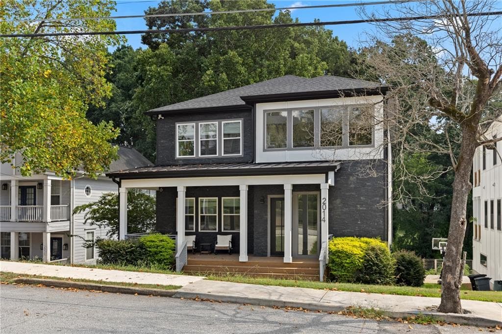 5 bedroom, 4 bathroom, 3,900 sq ft single family residence for sale at 2014 Cambridge Avenue, College Park, GA 30337 — photo 3