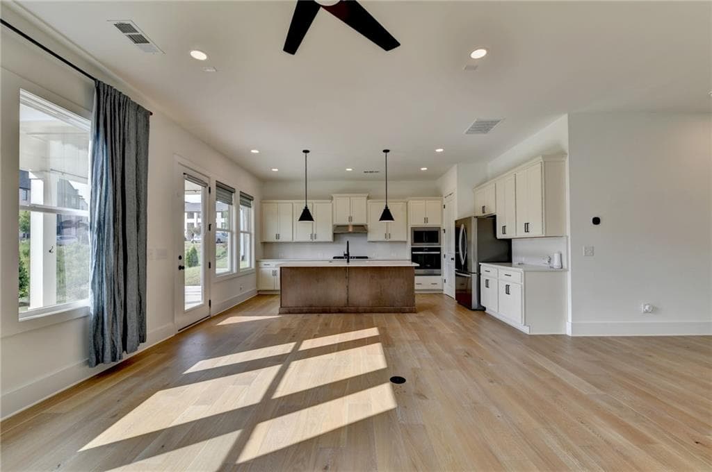 5 bedroom, 4 bathroom, 3,590 sq ft single family residence for sale at 1205 Westshore Drive, Cumming, GA 30041 — photo 6