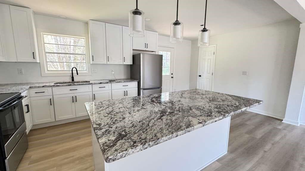 4 bedroom, 2 bathroom, 1,326 sq ft single family residence for sale at 723 Sheffield Road, Norcross, GA 30071 — photo 4